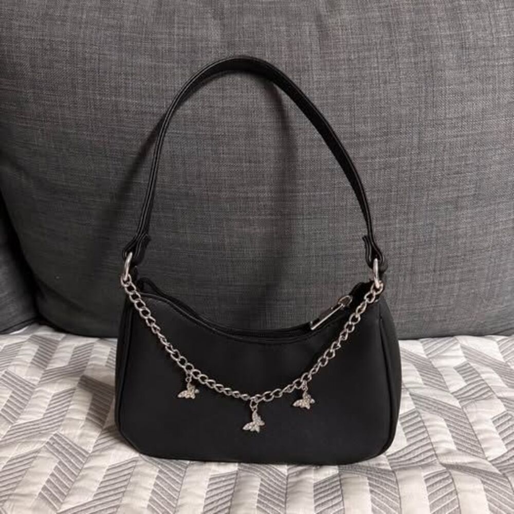Black shoulder bag with silver butterfly charms